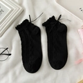 Süße schwarze Söckchen mit Rüschenrand und filigraner Schleife für Damen - Einheitsgröße / Schwarz / Schwarze Schleife