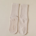 Beige mid-calf yoga socks with non-slip silicone grips and vertical ribbed knit texture - Khaki