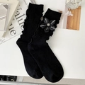 Elegant black mid-calf socks featuring a floral ribbon and ruffled trim in a retro style - Black / Ribbon Flower (23111 Black)