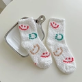 Calze morbide in pile corallo bianco con sorrisi colorati e uno stile accogliente da casa - Taglia unica / Bianco con Faccina Sorridente Multicolore