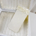 Cream white Lolita calf socks featuring delicate lace edges and ribbon bow detail - One Size / Beige