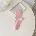 Minimalist light pink cotton mid-calf socks for women in a stylish lifestyle setting - Deep Pink