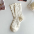 Creamy white crew socks with ruffle cuffs and textured diamond knit patterns - Lettuce Edge Cable Knit (Cream)