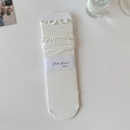 White ribbed crew socks featuring delicate double-layer ruffled edges for a sweet style - One Size / Bleached White