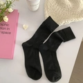 Lolita style black heart cutout mesh calf socks with sweet JK aesthetic and ribbed cuffs - Black
