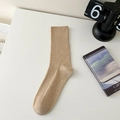 Minimalist khaki mid-calf sock with vertical stripes in a clean lifestyle setting - One Size / Khaki