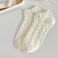 Milk white low cut ankle socks with classic diamond cable knit pattern and ribbed cuff - Twisted