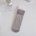 Gray ribbed slouch socks in minimalist style with vertical knit pattern and soft texture - One Size / Gray