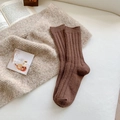 Deep brown vertical ribbed wool blend mid-tube socks displayed on a cozy warm knit background - One Size / Dark Coffee