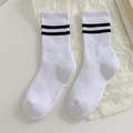 White crew cotton socks featuring double black stripes and ribbed elastic cuffs - White with Two Stripes