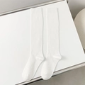 Solid white ribbed knee-high cotton socks in a minimalist Japanese JK style - One Size / White
