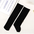 Japanese Lolita style black knee-high socks with hollow-out cut detail and ribbed texture - One Size / Black