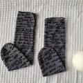 Dark gray mesh mid-calf socks with all-over black script lettering on a white background - Gray