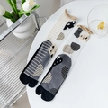 Japanese style tabi socks with polka dots and stripes pattern on a minimalist table - One Size / Grey Stripe