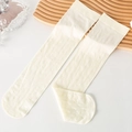 Calze lunghe color crema in velluto con motivi verticali e bordo elastico alto e largo - Beige