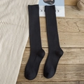Classic black ribbed knit high socks for women in a cozy minimalist winter style - One Size / Black