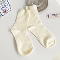 Minimalist cream-white ribbed mid-calf socks shown in a cozy Japanese lifestyle setting - Women's One Size 34-39 / Off-white