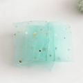 Mint green sheer mesh fabric with gold and silver foil star and moon patterns - One Size / Green