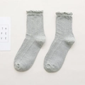 Light gray cotton knit socks with elegant ruffle cuffs and vertical cable pattern - Gray