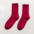 Deep red mid-calf cotton socks featuring cable knit patterns and wavy lettuce edge cuffs - Burgundy