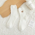 White coral fleece socks with cute brown bear embroidery in a cozy home setting - Bear Head Embroidery / White