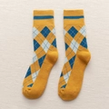 Calze lavorate a maglia stile British argyle in giallo senape e blu scuro - Giallo