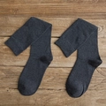 Deep grey cotton crew socks with ribbed cuffs on vintage wood background - One Size / Dark Gray