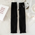 Süße schwarze Strickbeinstulpen mit Schleife und gewelltem Saum für den Winter - Rippstrick Schleife Stil / Schwarz
