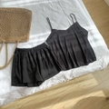 Women's black satin camisole and shorts pajama set on white bedsheets with sun shadows - M / Black