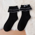 Sweet Lolita black mid-calf socks featuring layered ruffles and a plaid bow accent - Black Bow