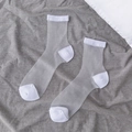 Sheer white glass silk crew socks with ribbed cuffs and reinforced toe on grey fabric - Solid White