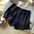 Black ice silk safety shorts for women featuring delicate eyelash lace and sweet bows - One Size / Black