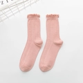 Pink mid-calf knit socks featuring elegant ruffle trim and pointelle hollow textures - One Size / Dusky Pink