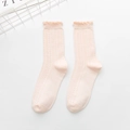Pale pink hollow-knit socks with delicate lace cuffs and vertical texture design - One Size / Light Pink