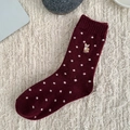 Calze di lana bordeaux a pois bianchi con delicato ricamo di renna per l'inverno - Ricamo a pois