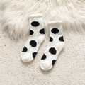 Winter coral fleece socks featuring a classic black and white polka dot design - One Size / White Polka Dot