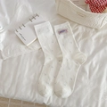 White crew socks with pink KIKI BOX logo and rib knit texture on soft bedding - Label Dot Style (RH2608)