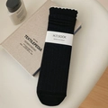 Calcetines negros a media pantorrilla con canalé vertical y delicado borde de volantes - Talla única / Negro