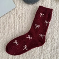 Burgundy wool blend socks with white bow jacquard pattern on soft knit background - One Size / Bow