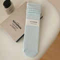 Light blue knit mid-calf socks with delicate eyelet texture and ruffled edges - One Size / Blue