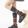 Dark grey knitted leg warmers with colorful stripes and ribbed cuffs for women - One Size / Dark Gray