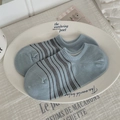 Low-cut light blue striped cotton boat socks displayed on a white ceramic plate - One Size / Blue