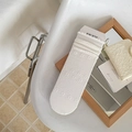 White crew socks with knit lace trim and wavy scalloped cuffs in a minimalist style - One Size / White