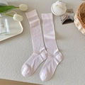 Japanese style light pink knee high socks with ribbed knit texture in a soft aesthetic - Pink