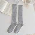Deep grey ballet style knee-high socks featuring intricate diamond knit patterns - One Size / Dark Gray
