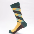 Men's retro argyle crew socks featuring vintage dark green and yellow diamond patterns - Black & Dark Green Color Block (MM1786 Diagonal Diamond Pattern)
