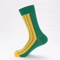 Calze creative a tema mais con foglie verdi e motivo a chicchi gialli - UE 41-46 / Stile Mais