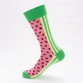 Calze rosa con motivi a semi di anguria e strisce laterali verdi decorative - UE 41-46 / Stile Anguria