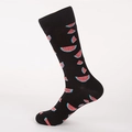 Fashionable mid-calf black socks featuring vibrant watermelon print and ribbed cuffs - Men's 41-46 / Black Base Watermelon