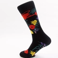 Mid-calf black cotton socks featuring colorful floral jacquard patterns and garden motifs - Black Floral Watering Can